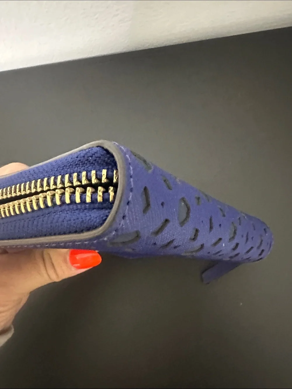 EUC kate spade cobalt blue laser-cut zip wallet with gold logo and Gold Zipper